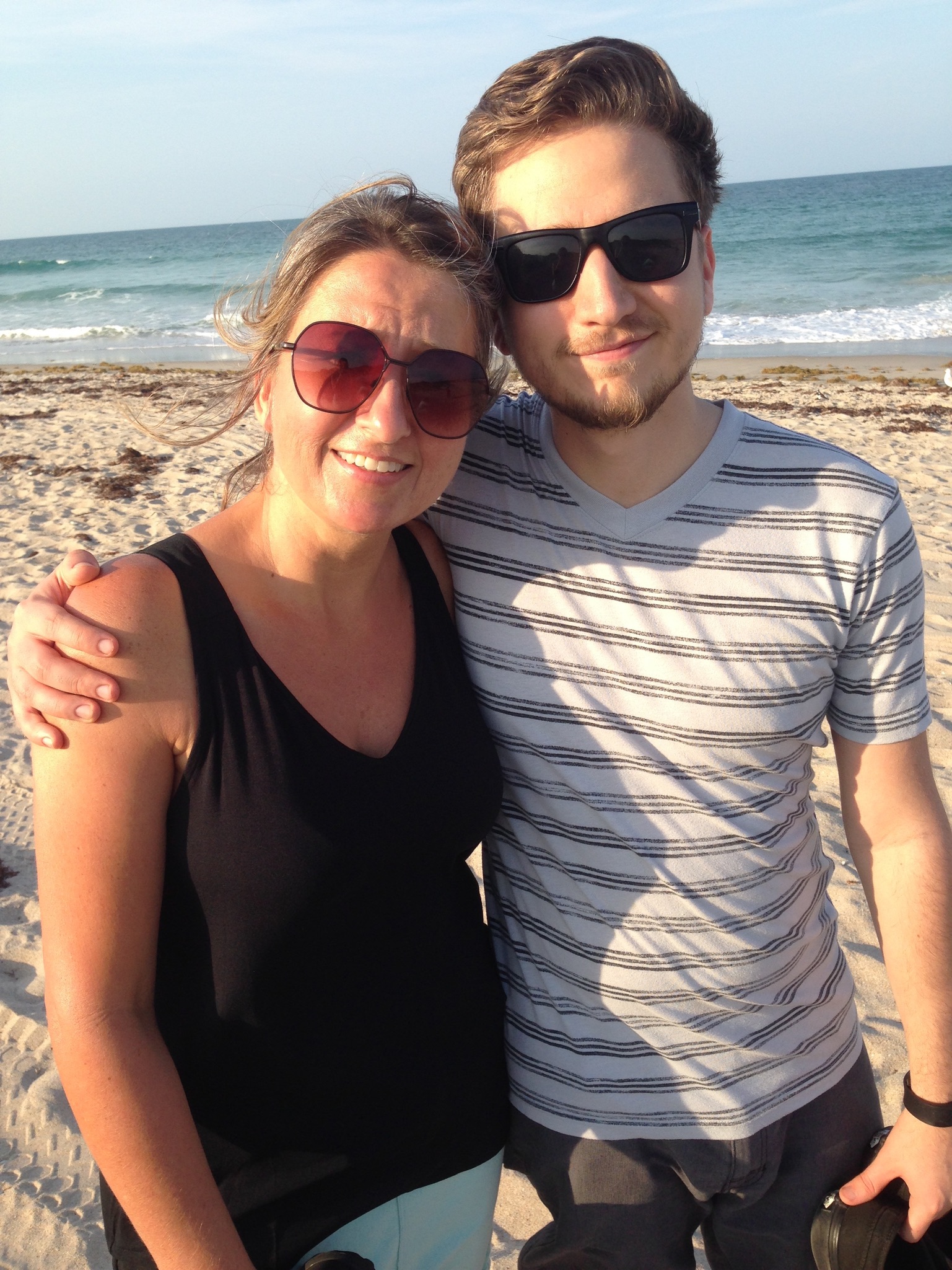 Renee with son at the beach